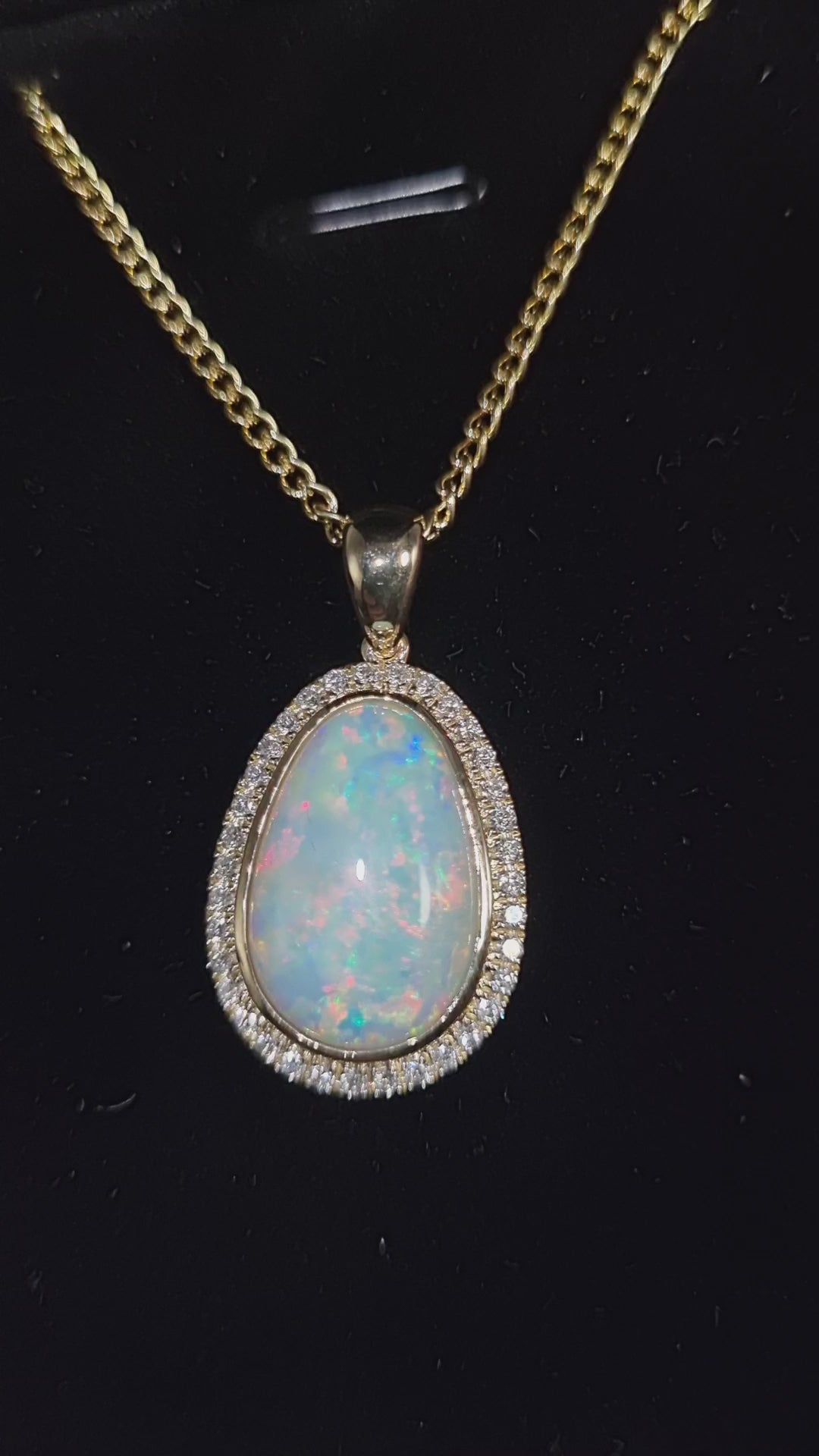 5.5ct Solid Opal in 9k Gold w/Zirconia