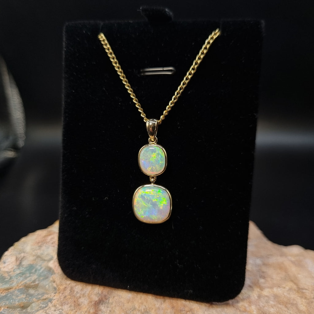 3.5ct Double solid Crystal Opal in 9k Gold