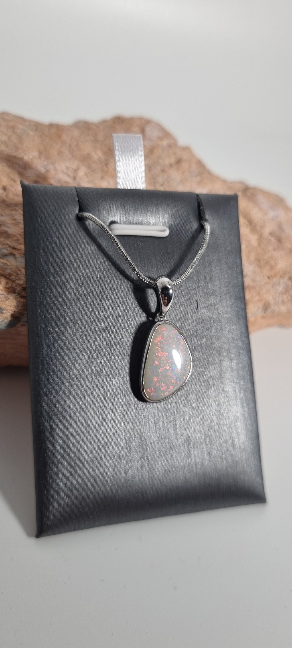 Solid white opal pendant silver 925