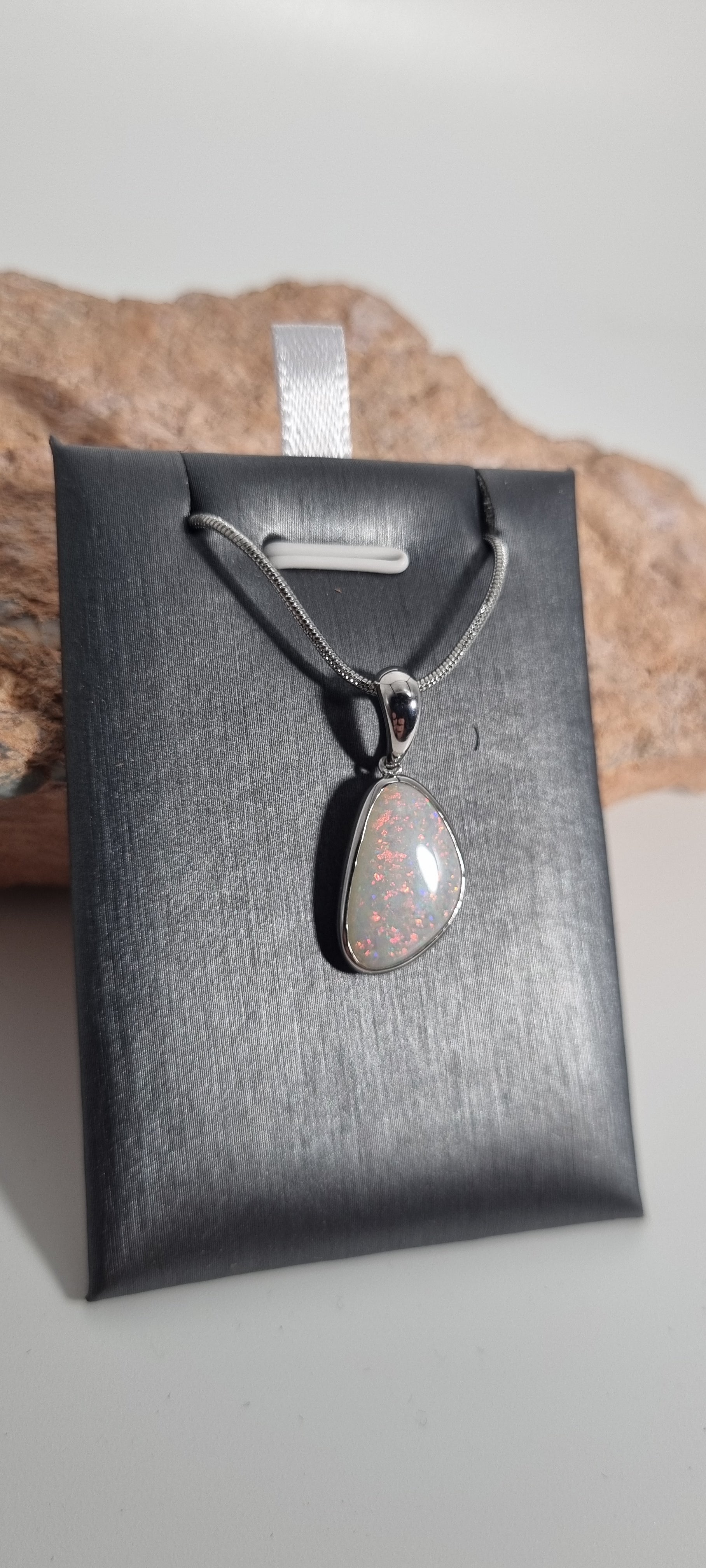 Solid white opal pendant silver 925