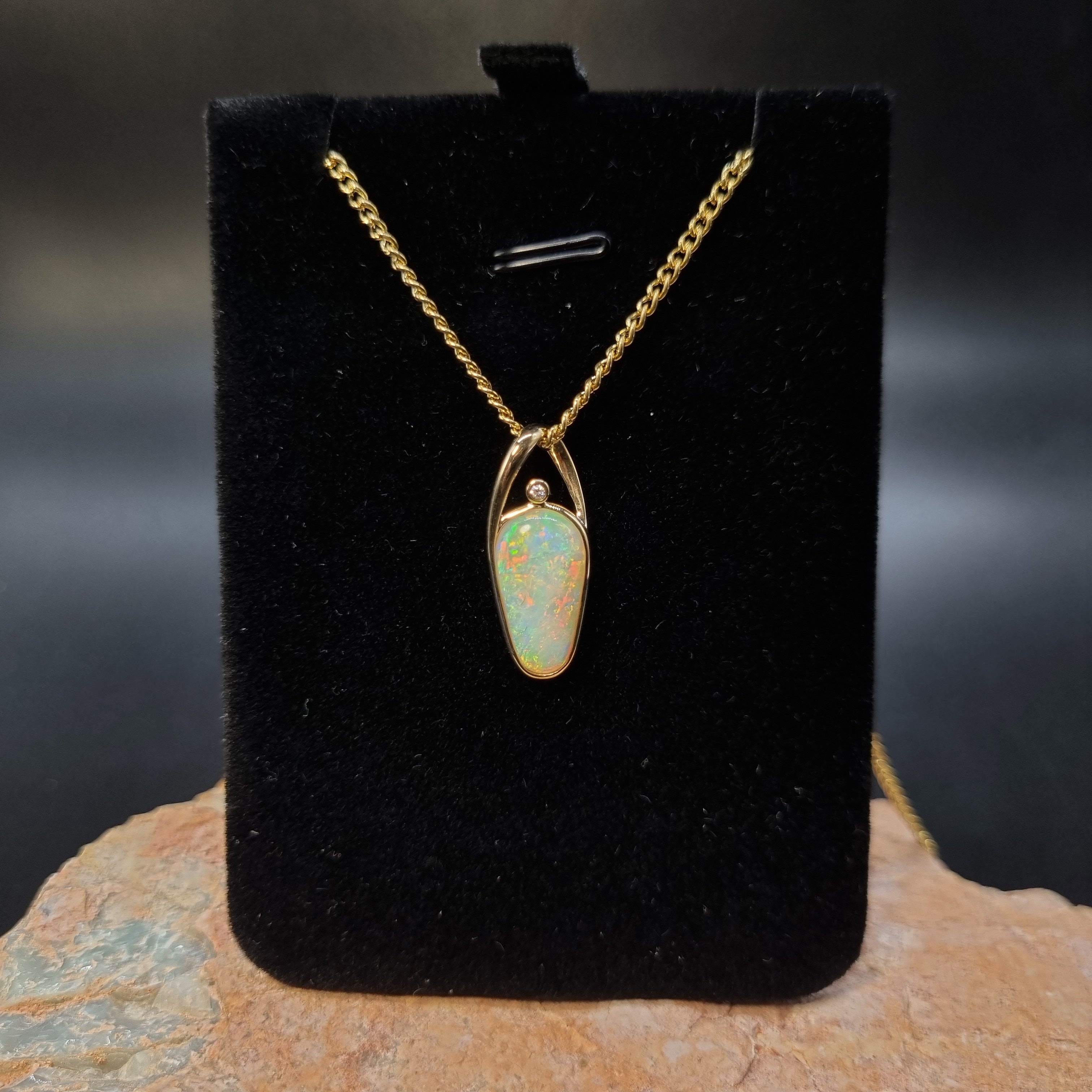3ct Solid Opal in 9k Gold w/Zirconia