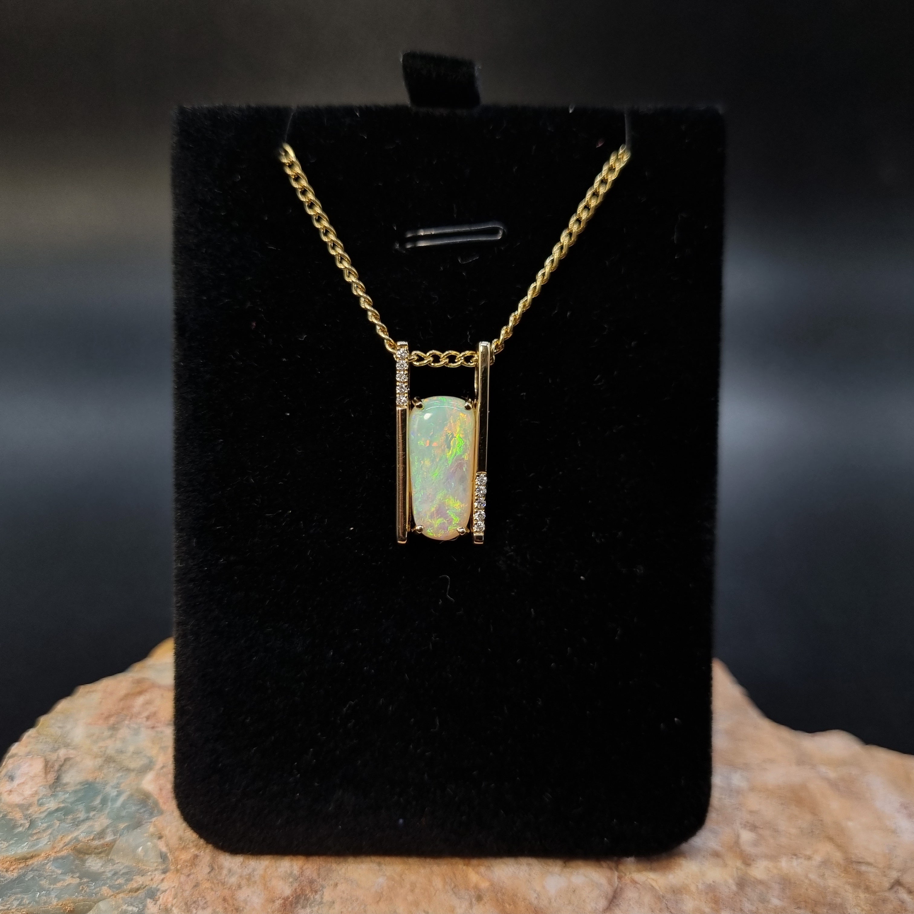 3.4ct Solid Opal in 9k Gold w/Zirconia