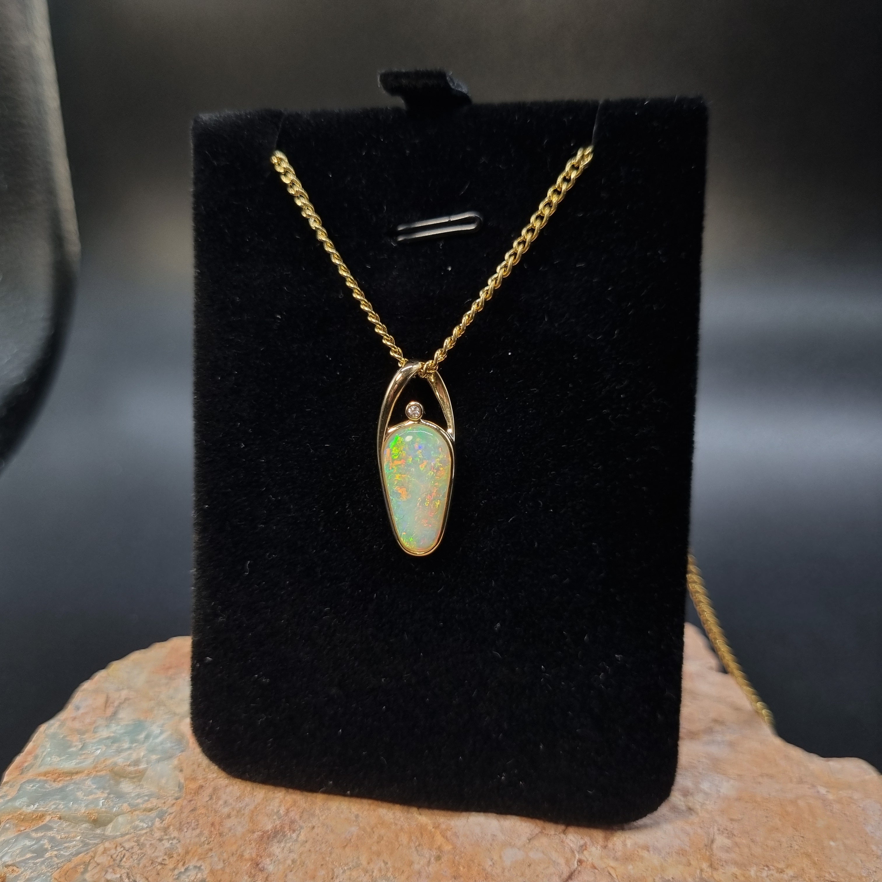 3ct Solid Opal in 9k Gold w/Zirconia