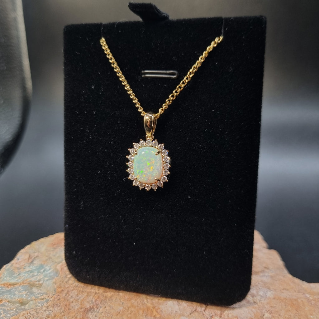 2.6ct Solid Opal in 9k Gold w/Zirconia