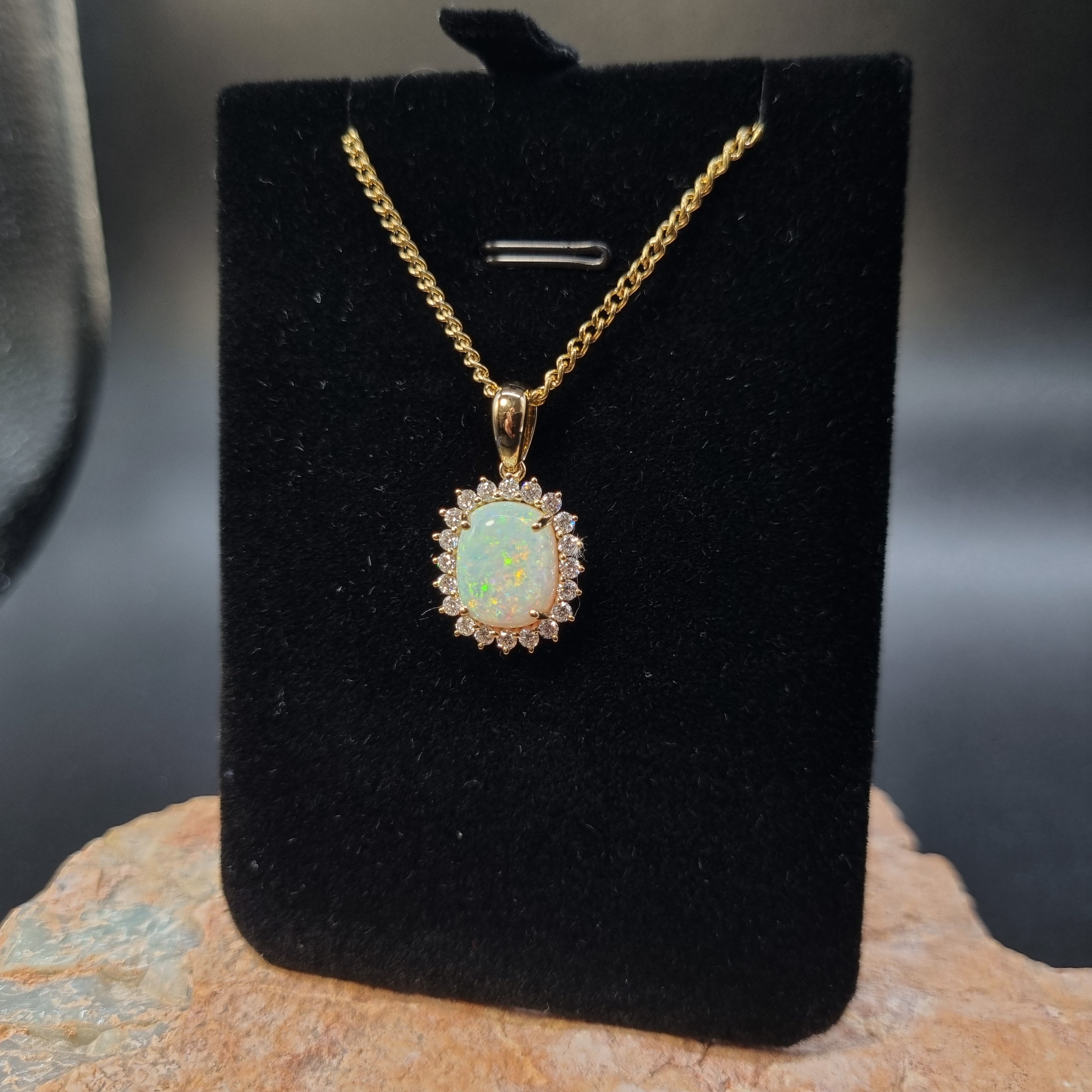 2.6ct Solid Opal in 9k Gold w/Zirconia