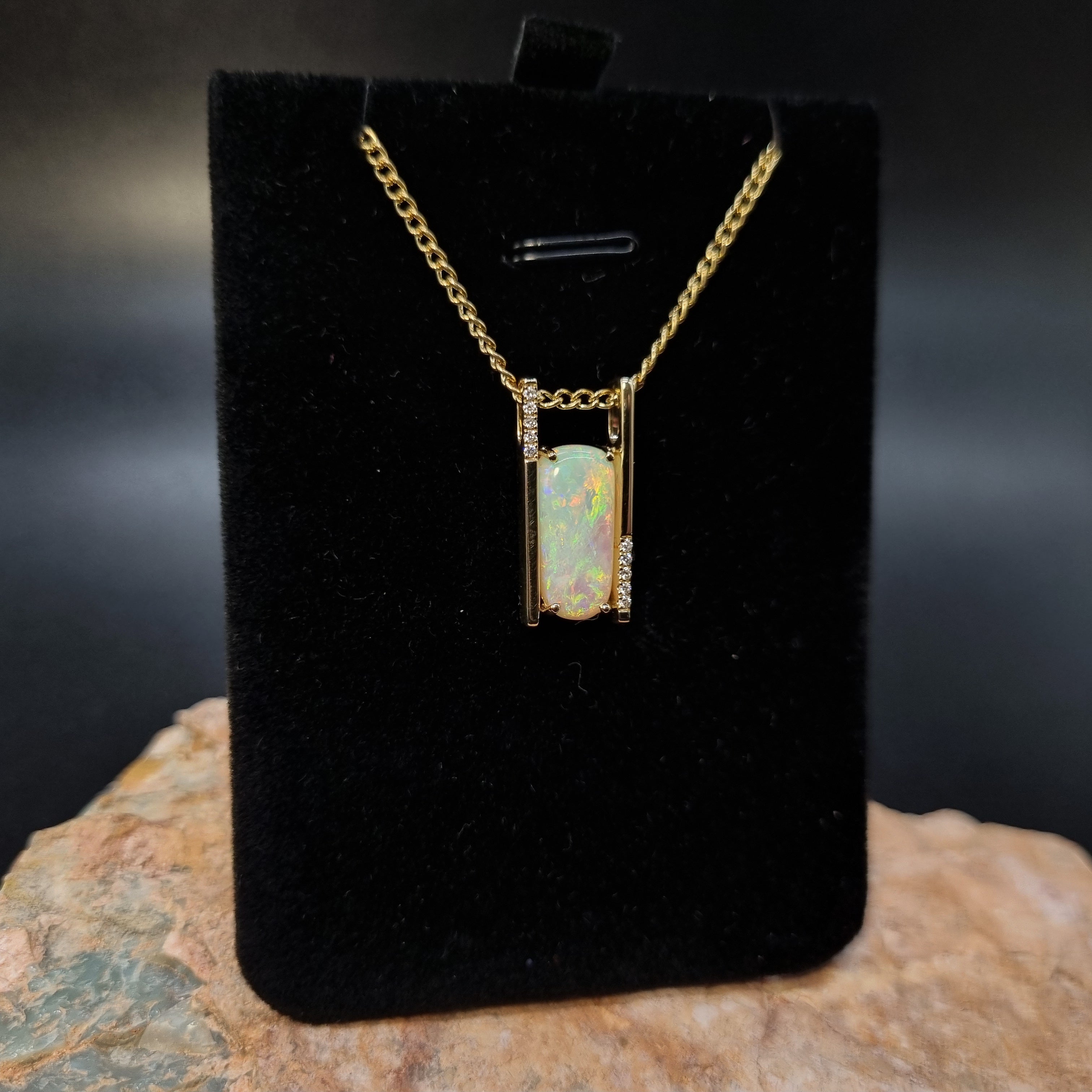 3.4ct Solid Opal in 9k Gold w/Zirconia