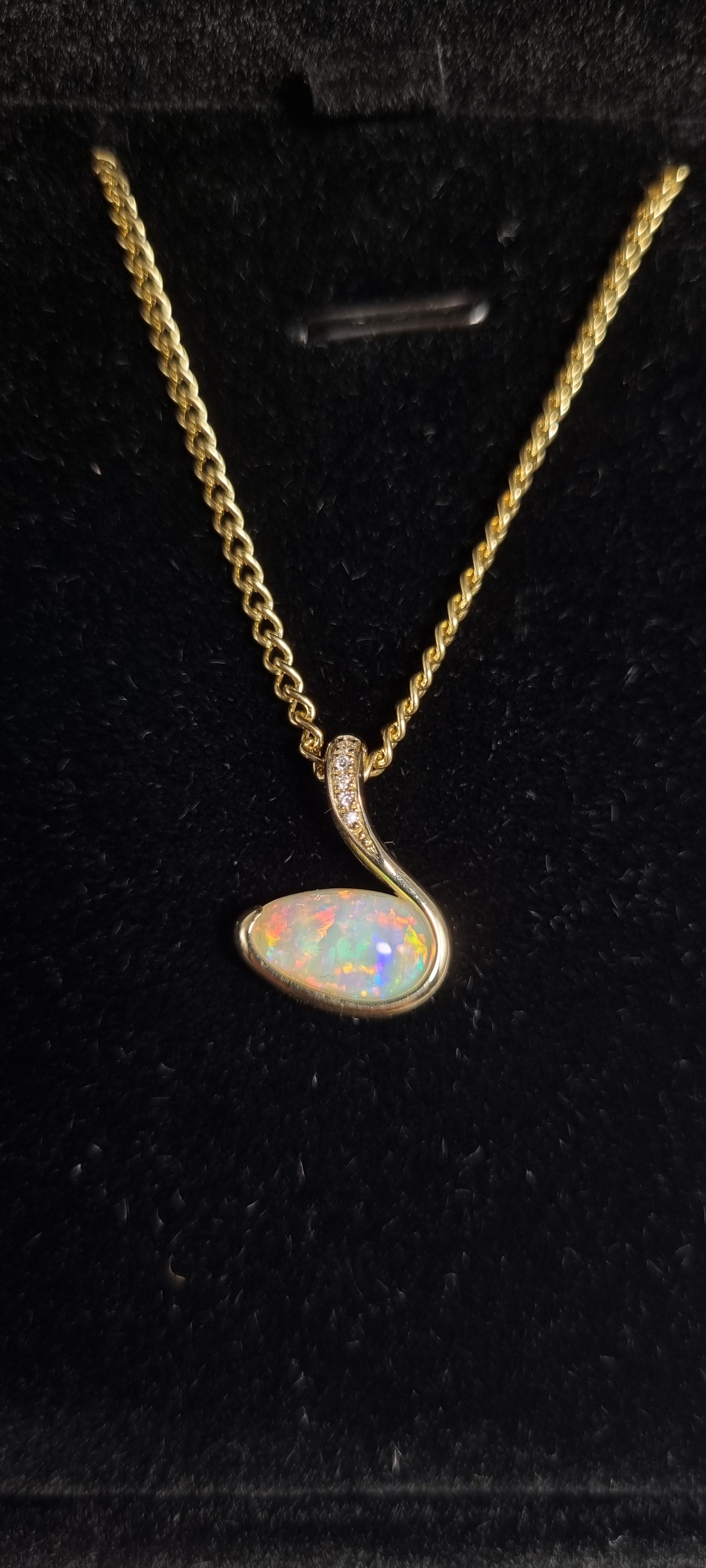 1.3ct Solid Opal in 9k Gold w/Zirconia