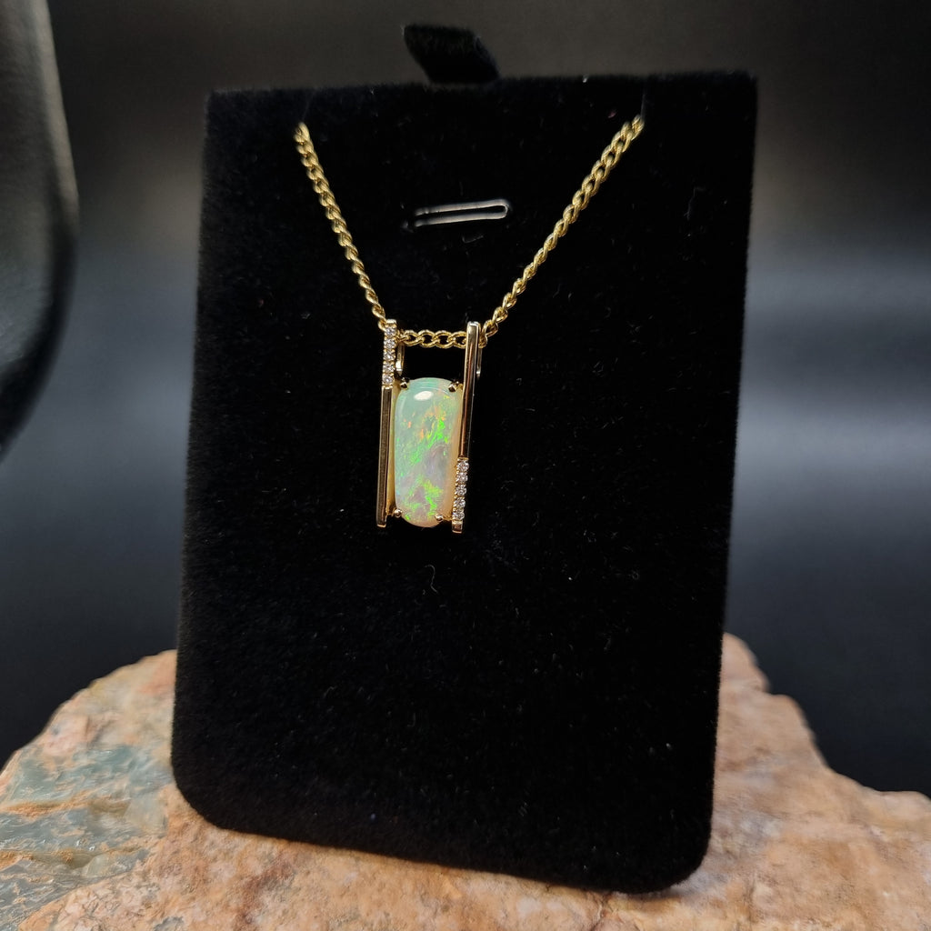 3.4ct Solid Opal in 9k Gold w/Zirconia