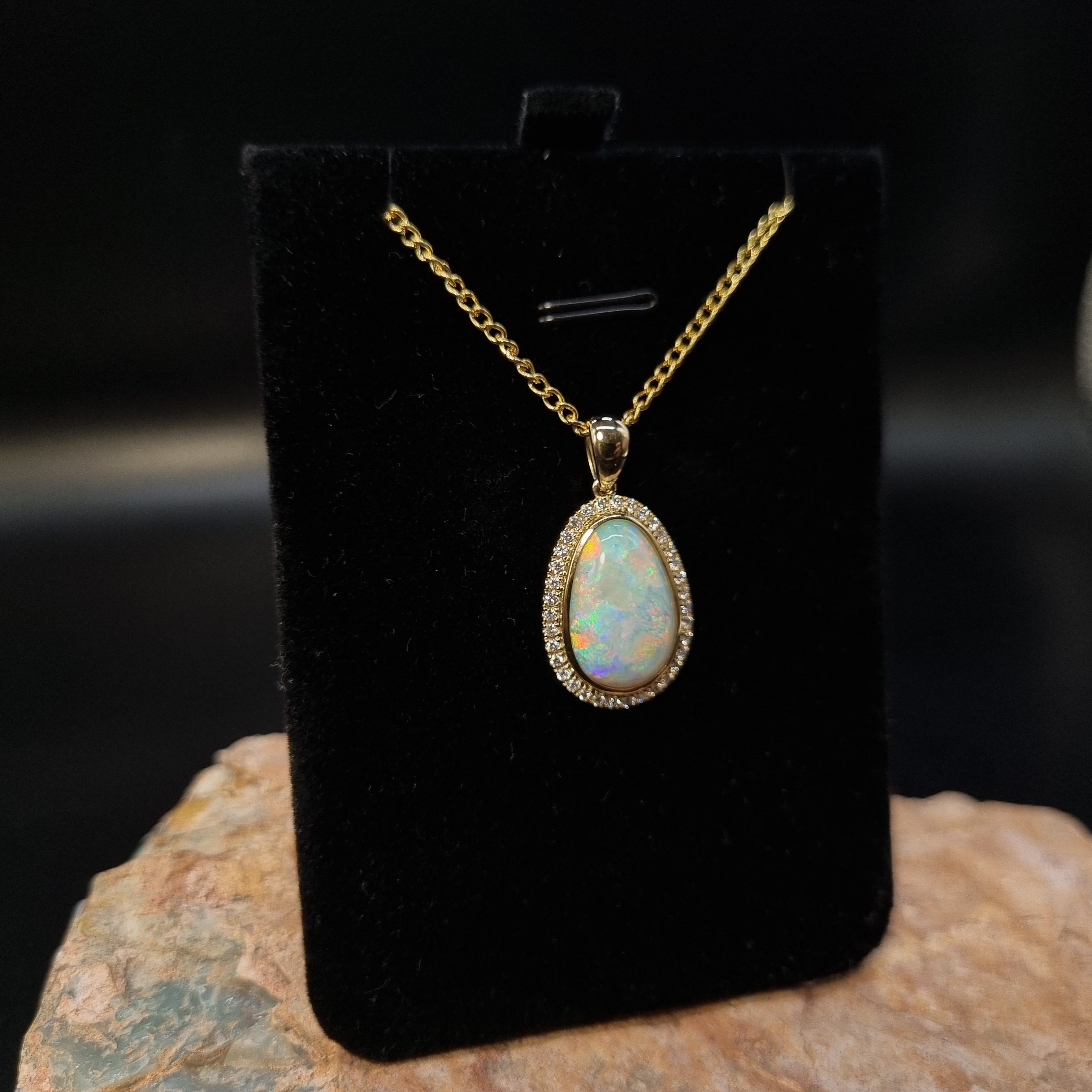 5.5ct Solid Opal in 9k Gold w/Zirconia