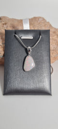 Solid white opal pendant silver 925