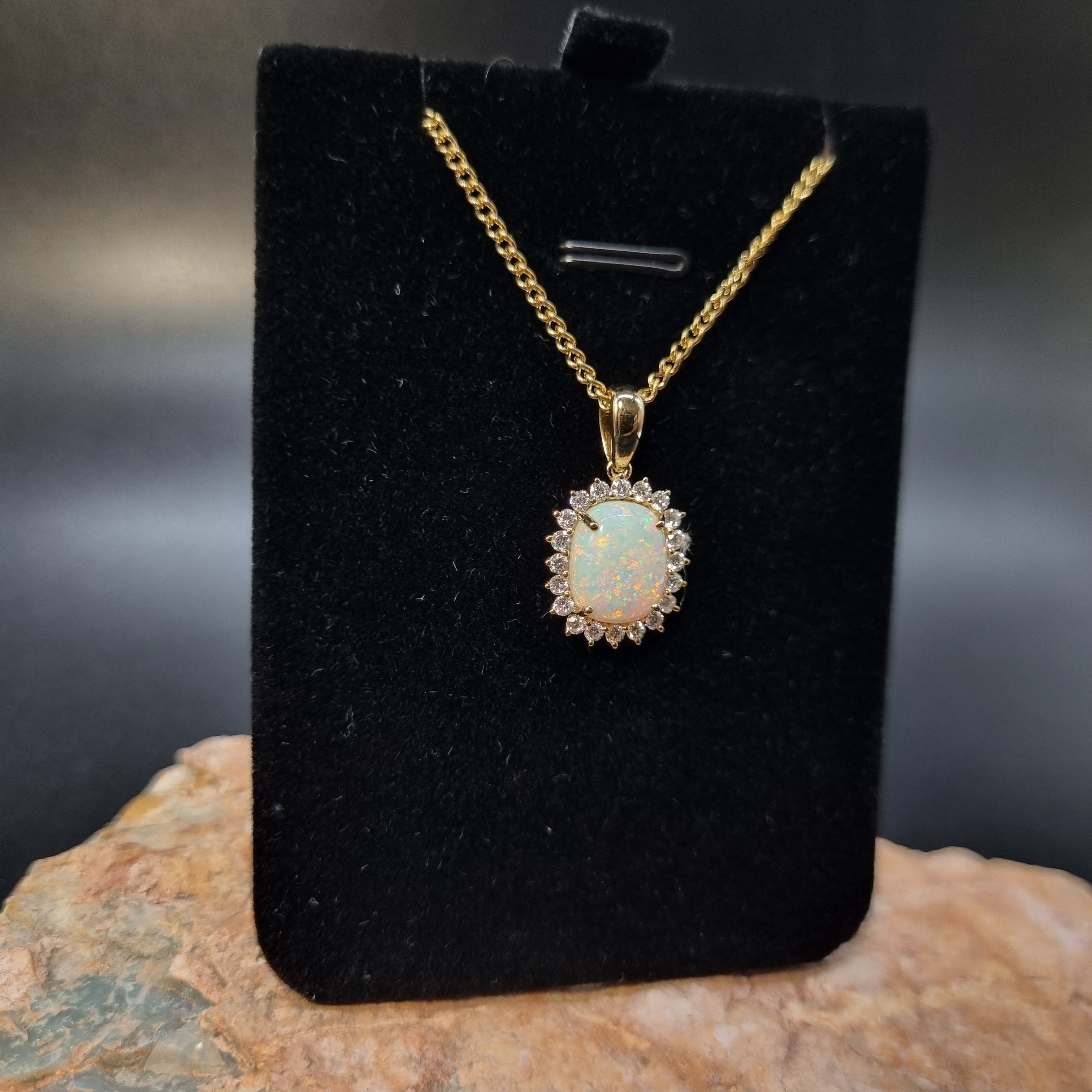 2.6ct Solid Opal in 9k Gold w/Zirconia