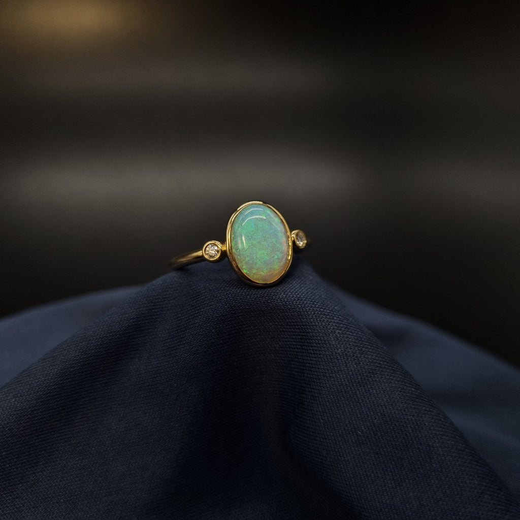 1.7ct Solid Opal in 9k Gold W/Zirconia