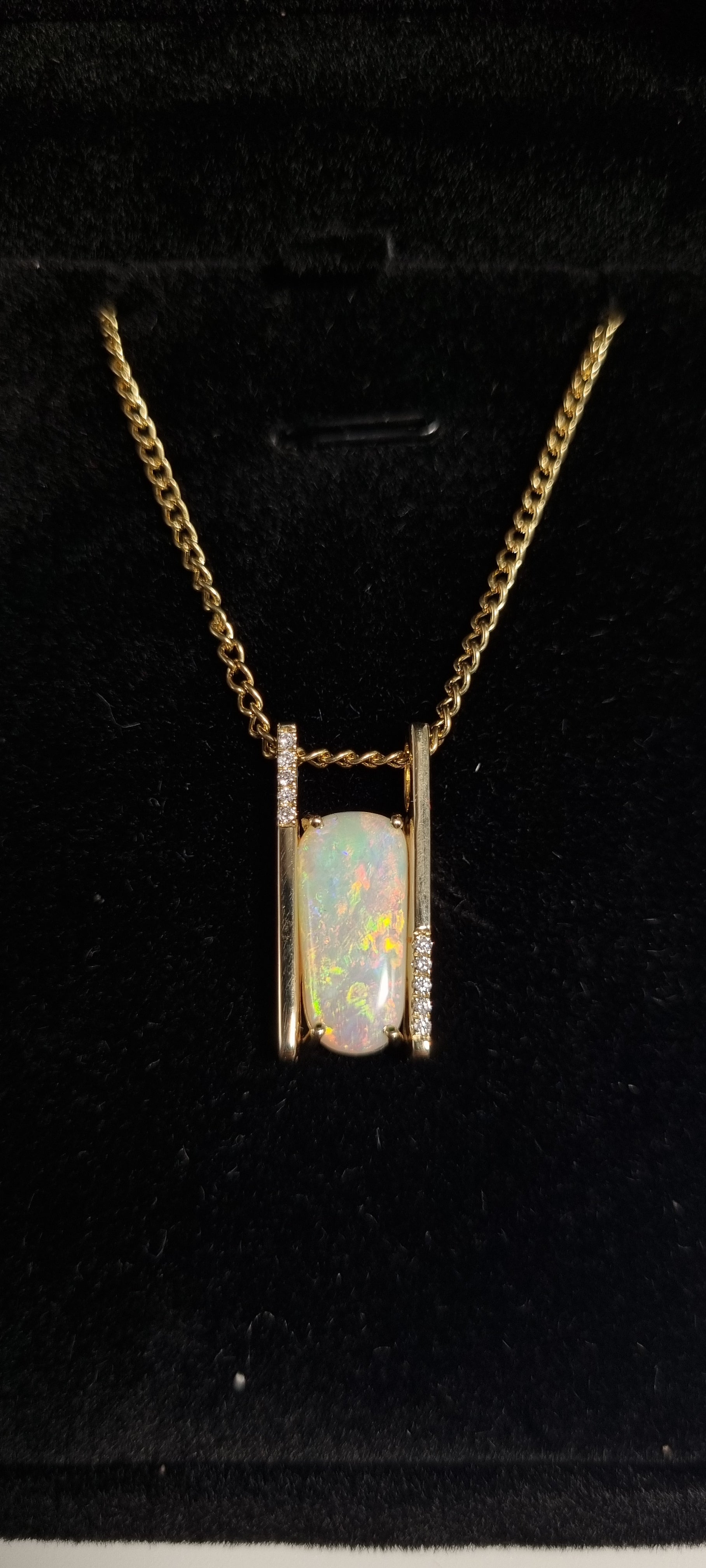 3.4ct Solid Opal in 9k Gold w/Zirconia