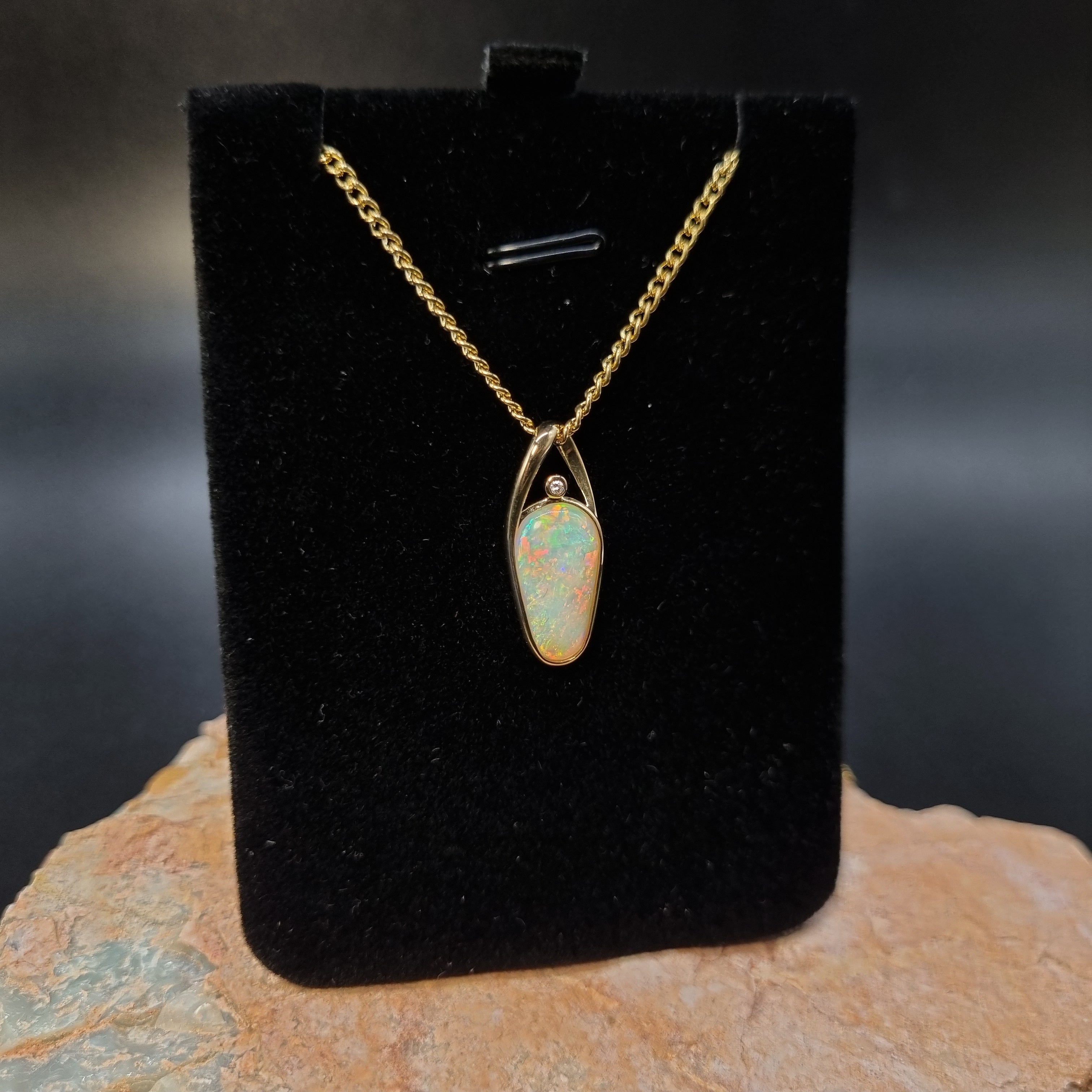 3ct Solid Opal in 9k Gold w/Zirconia