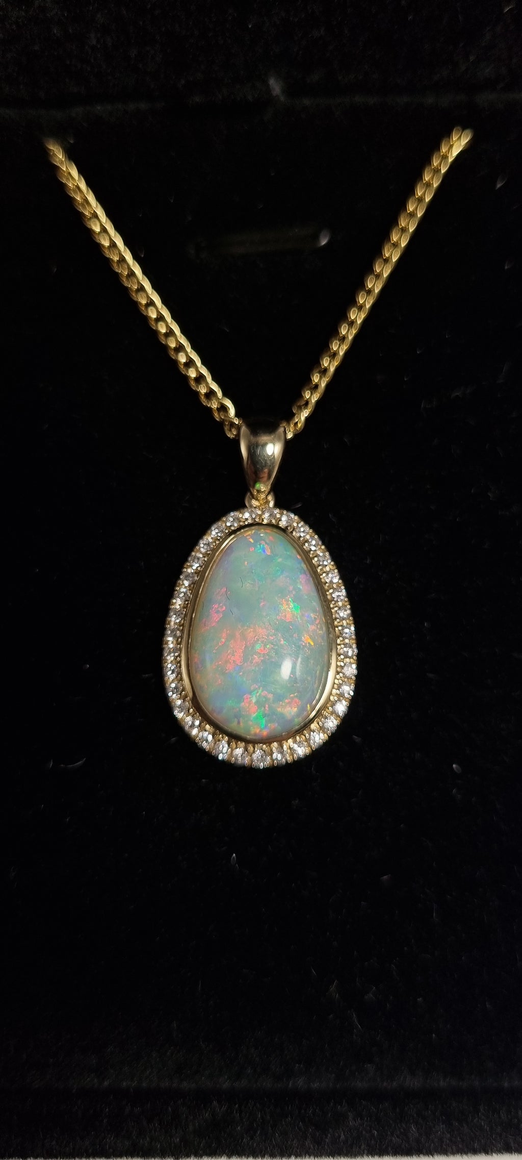 5.5ct Solid Opal in 9k Gold w/Zirconia