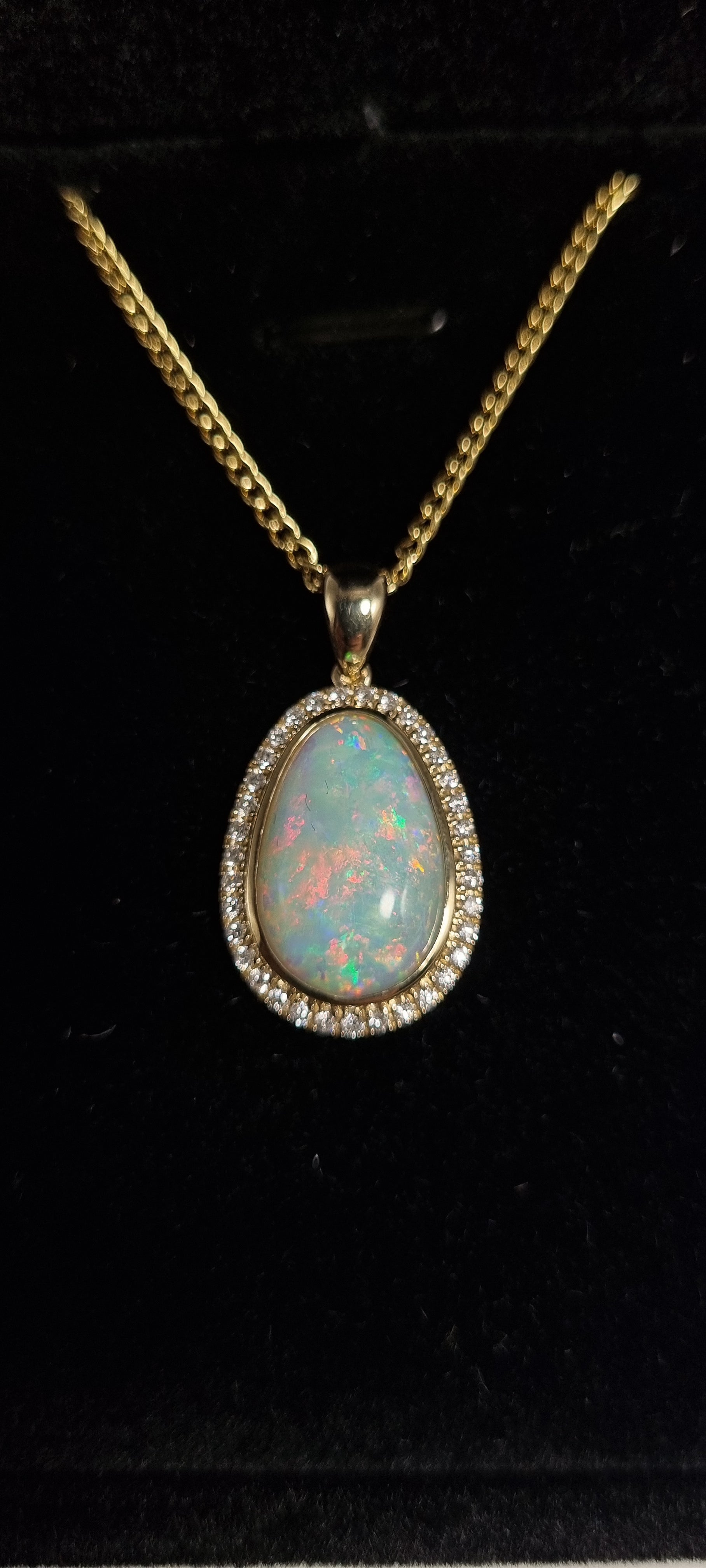5.5ct Solid Opal in 9k Gold w/Zirconia
