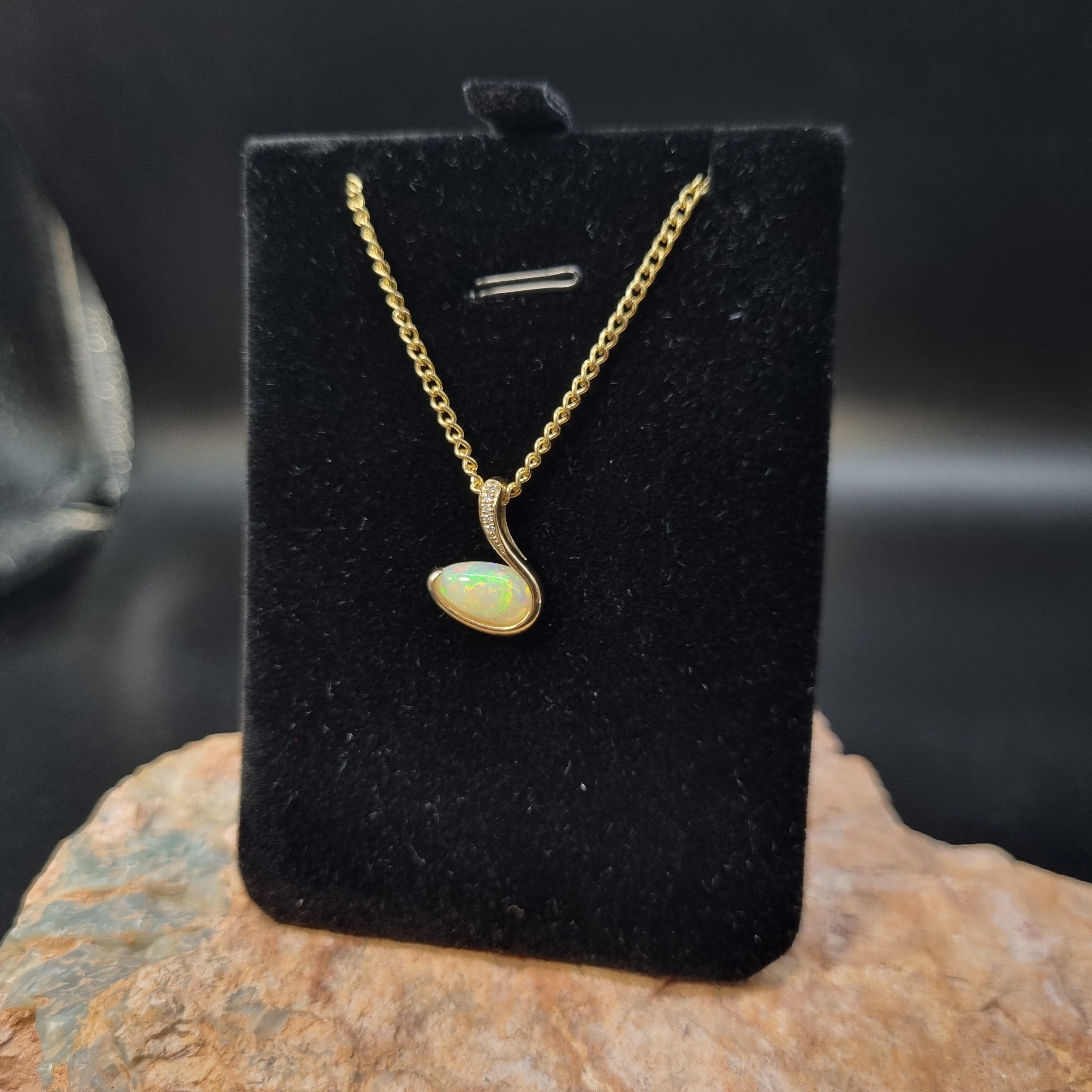 1.3ct Solid Opal in 9k Gold w/Zirconia