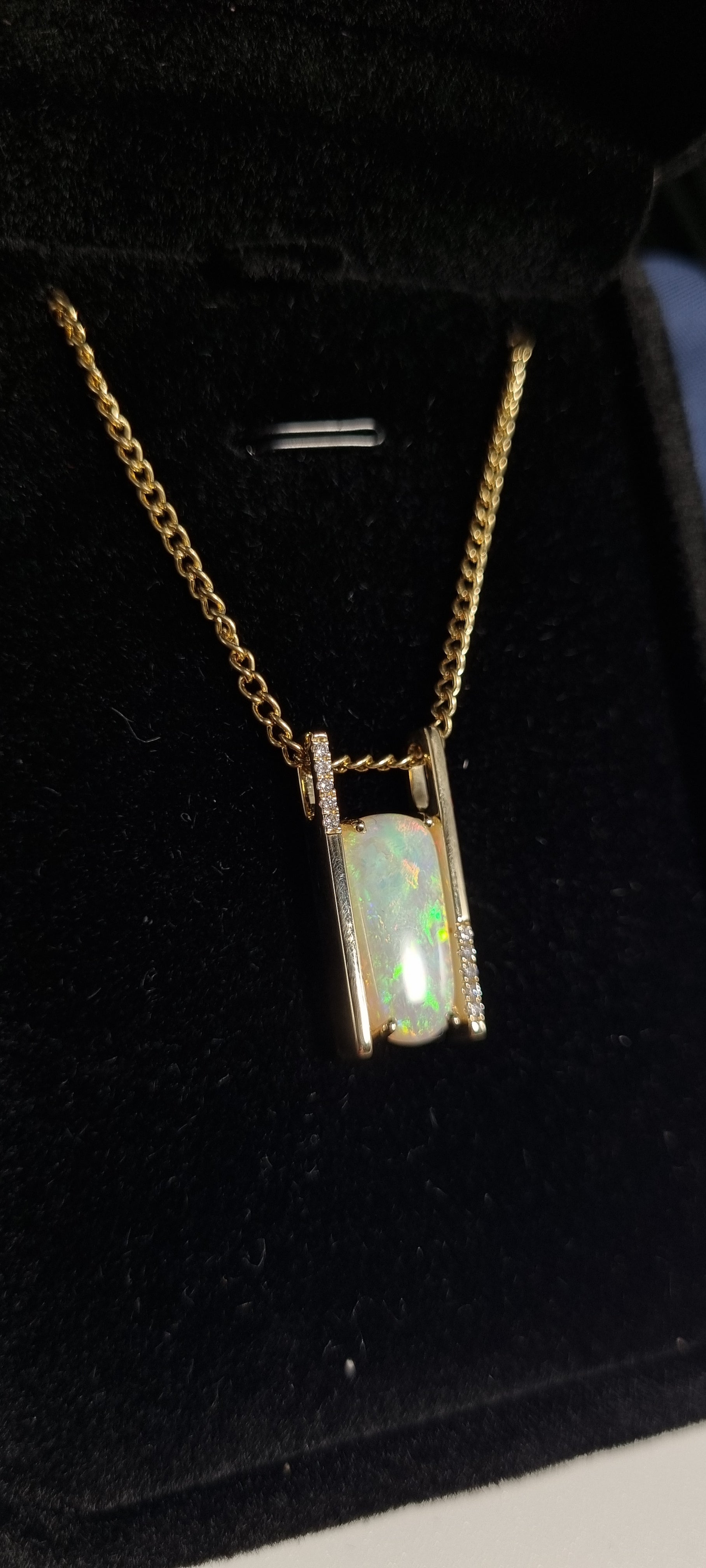 3.4ct Solid Opal in 9k Gold w/Zirconia
