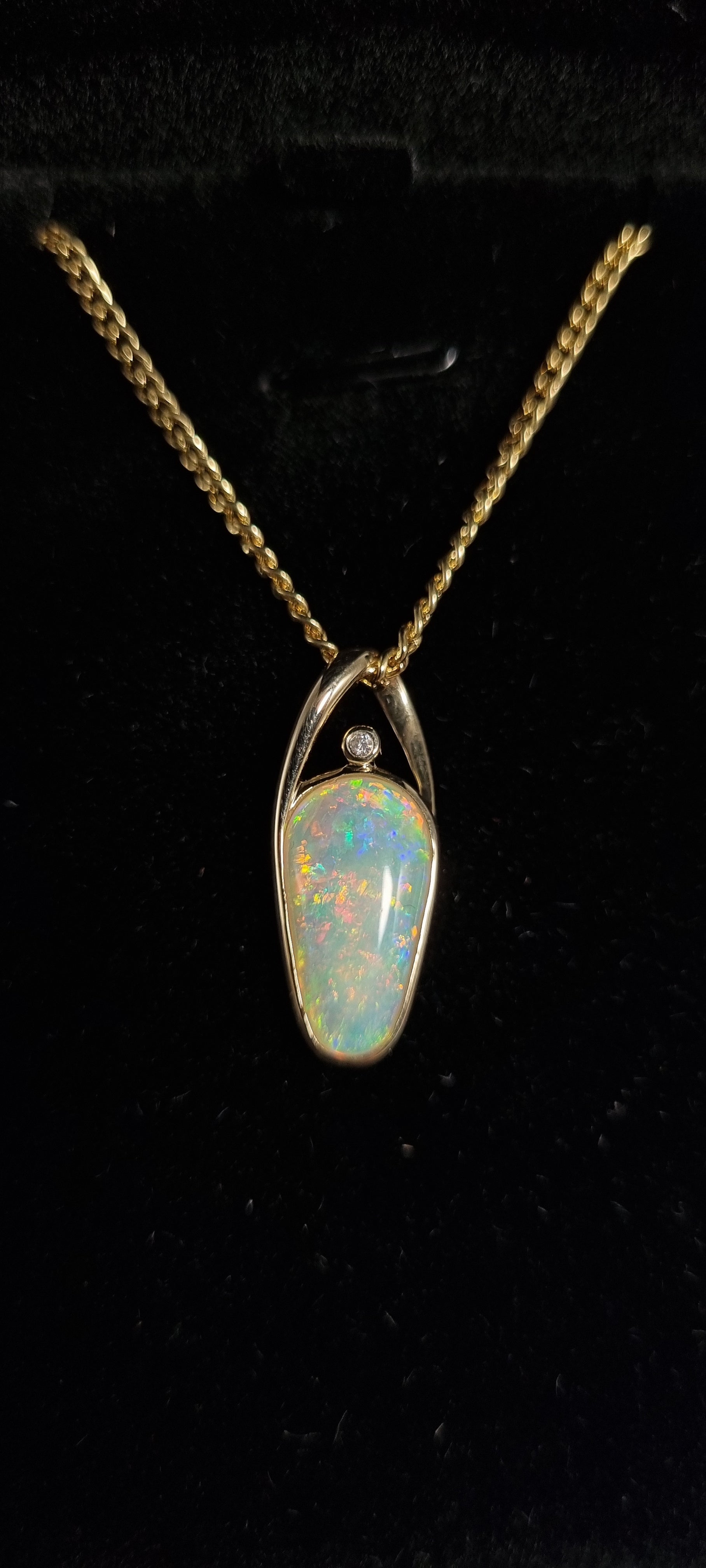 3ct Solid Opal in 9k Gold w/Zirconia