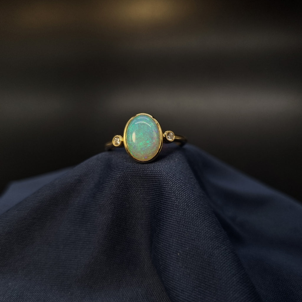 1.7ct Solid Opal in 9k Gold W/Zirconia