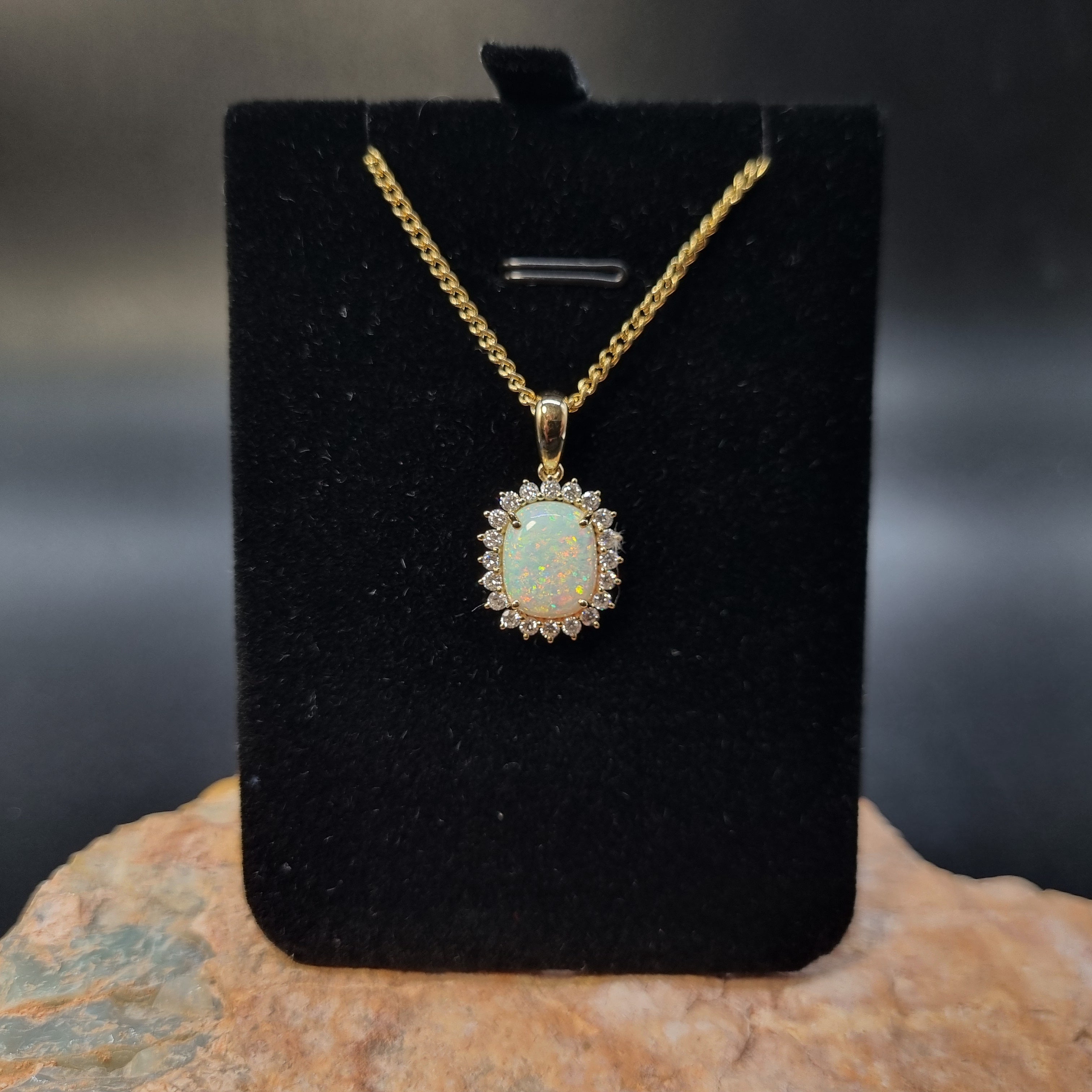 2.6ct Solid Opal in 9k Gold w/Zirconia